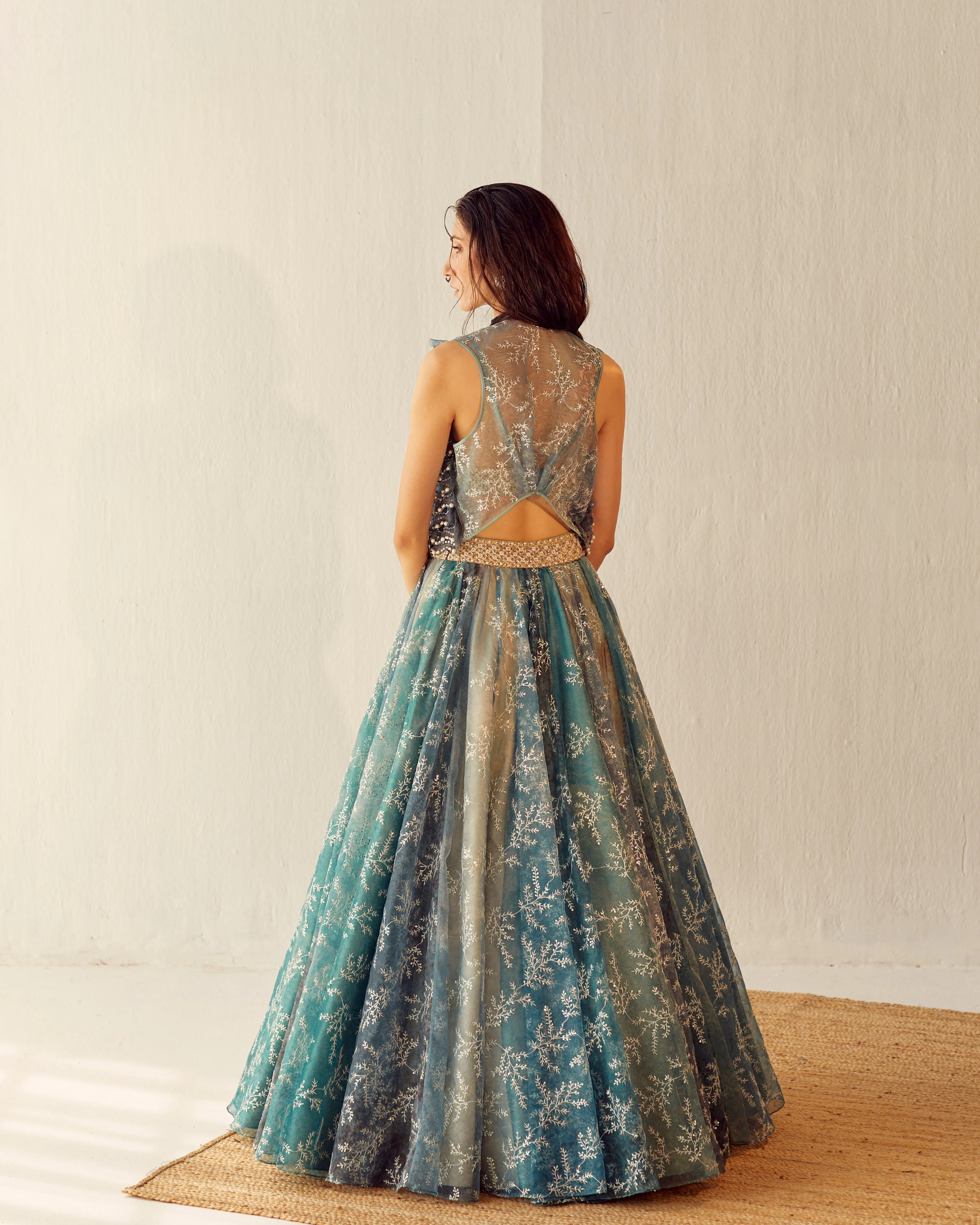 Lake Blue Organza Lehenga Set With Embroidered Gilet